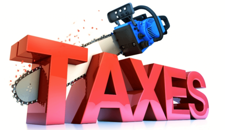 Chainsaw cutting into the word "taxes" graphic