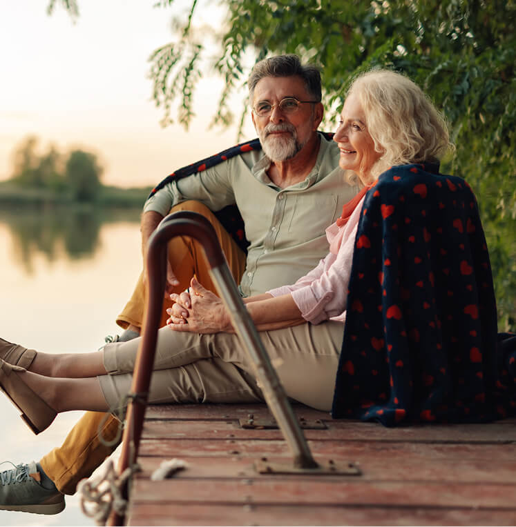 Retirees sitting on a dock